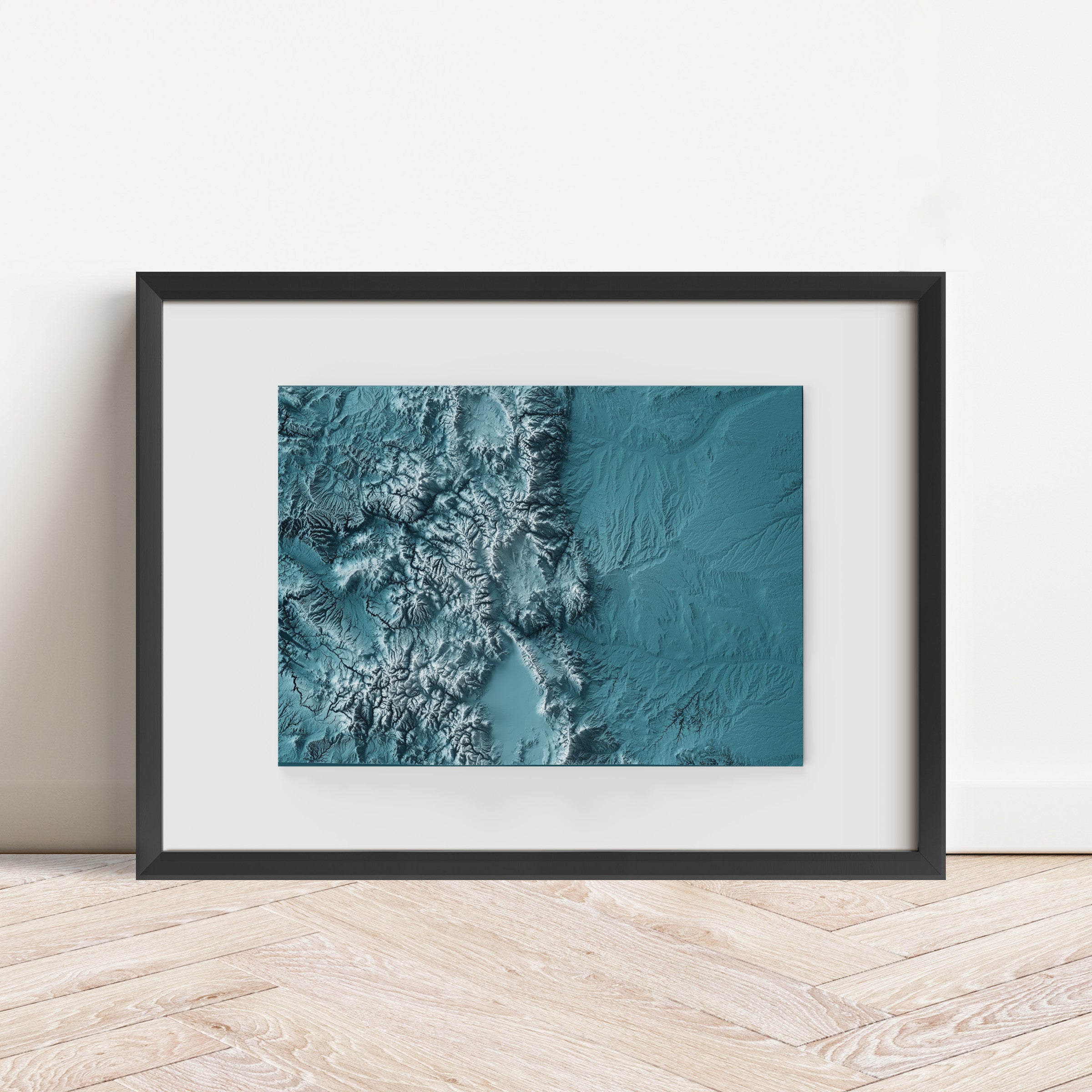 Framed minimalist elevation map of Colorado. Minimalist topographic map art featuring detailed topography, available as premium poster for home or office decor.