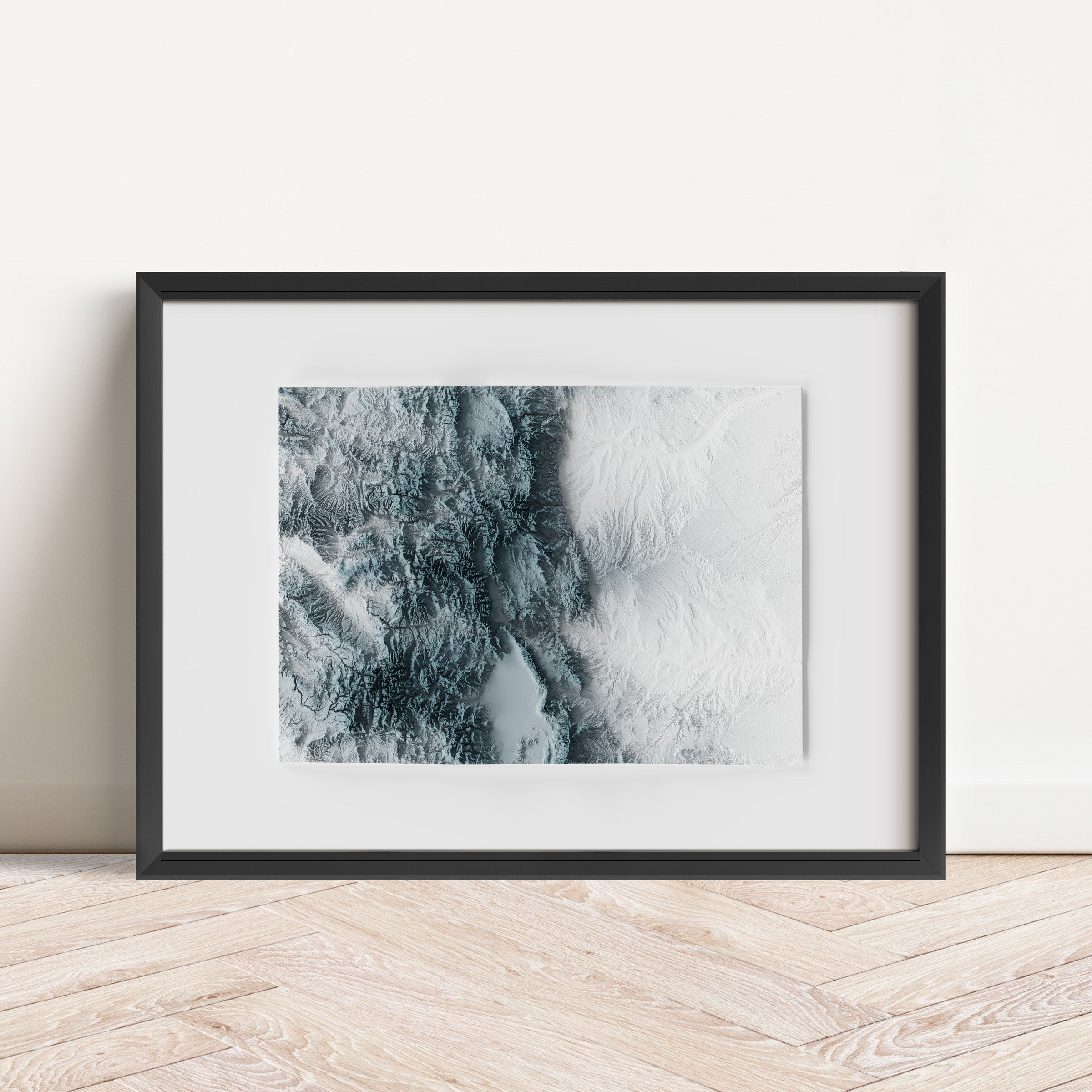 Framed minimalist elevation map of Colorado. Minimalist topographic map art featuring detailed topography, available as premium poster for home or office decor.