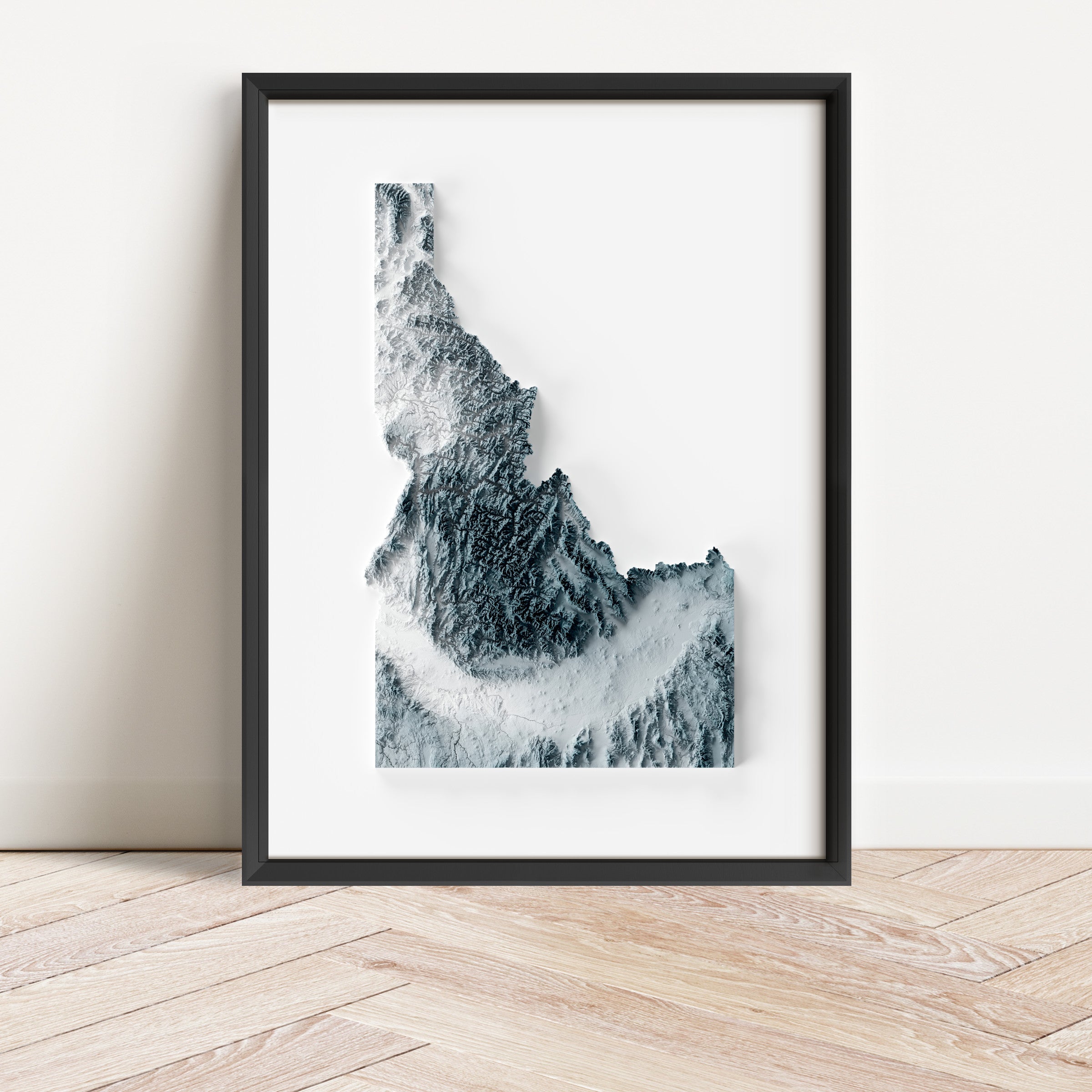 Framed minimalist elevation map of Idaho. Minimalist topographic map art featuring detailed topography, available as premium poster for home or office decor.