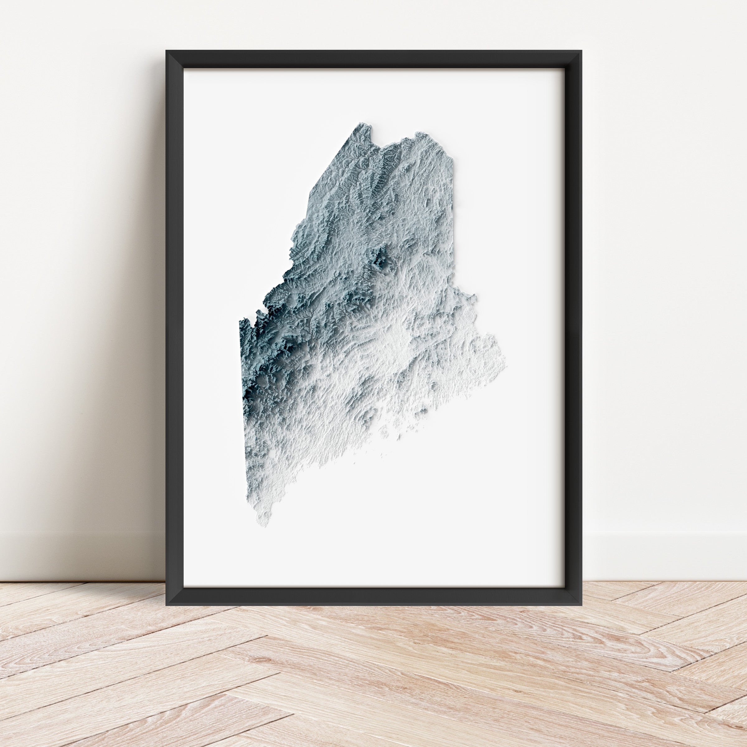 Framed minimalist elevation map of Maine. Minimalist topographic map art featuring detailed topography, available as premium poster for home or office decor.