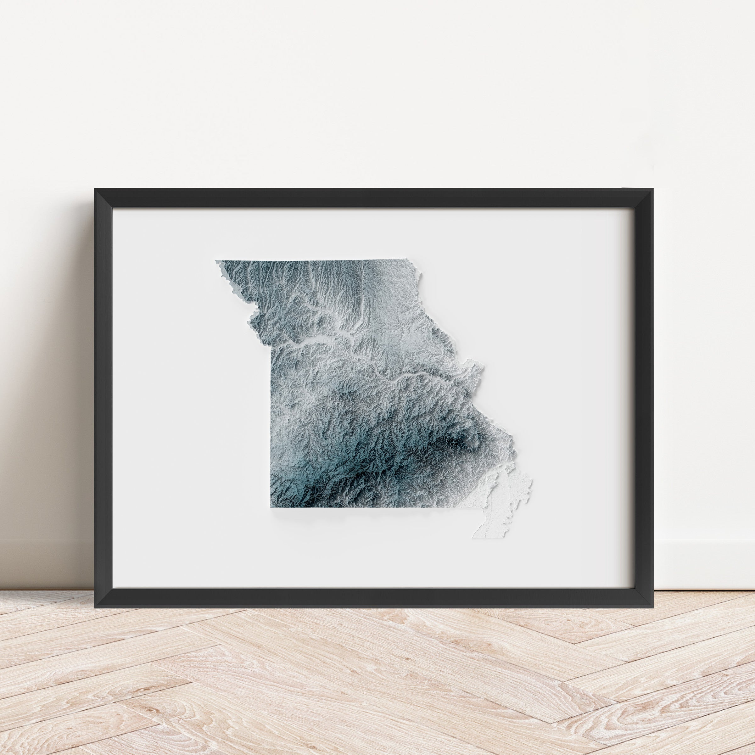 Framed minimalist elevation map of Missouri. Minimalist topographic map art featuring detailed topography, available as premium poster for home or office decor.