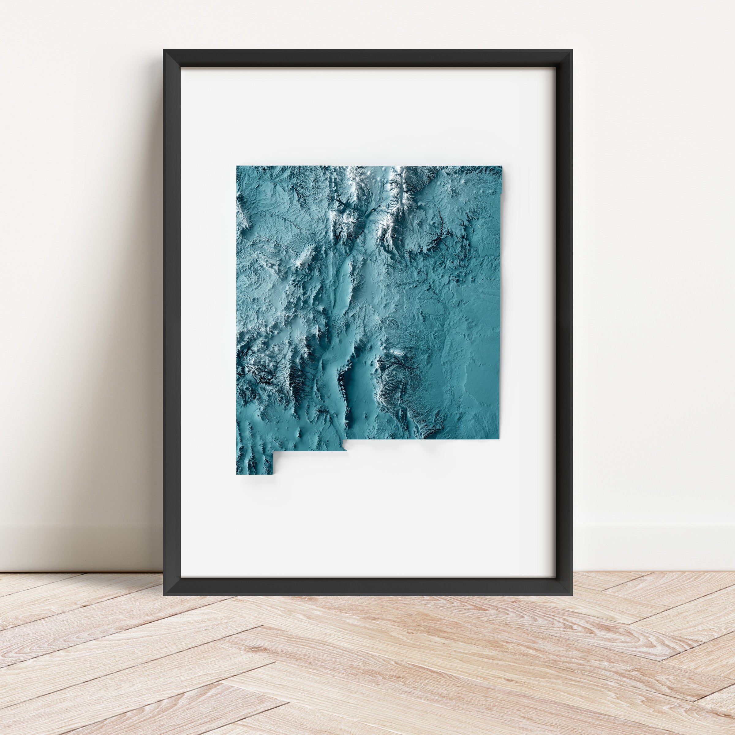 Framed minimalist elevation map of New Mexico. Minimalist topographic map art featuring detailed topography, available as premium poster for home or office decor.