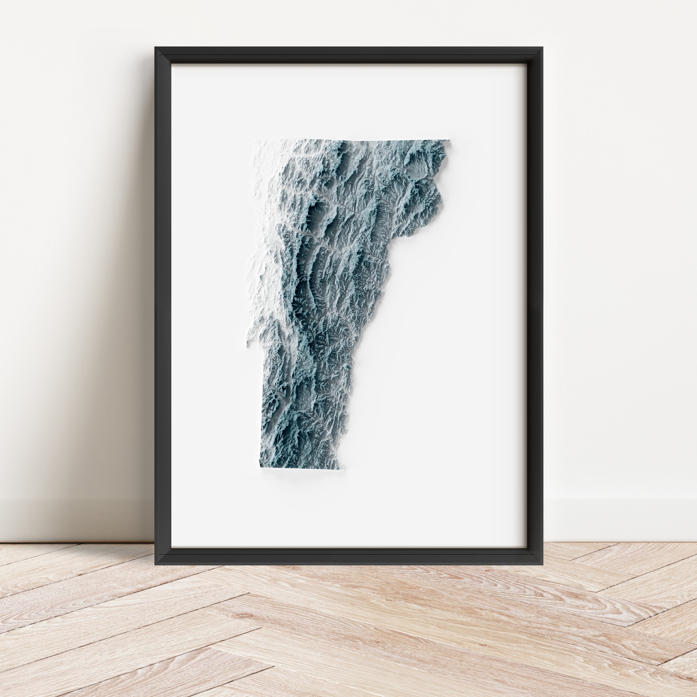 Framed minimalist elevation map of Vermont. Minimalist topographic map art featuring detailed topography, available as premium poster for home or office decor.