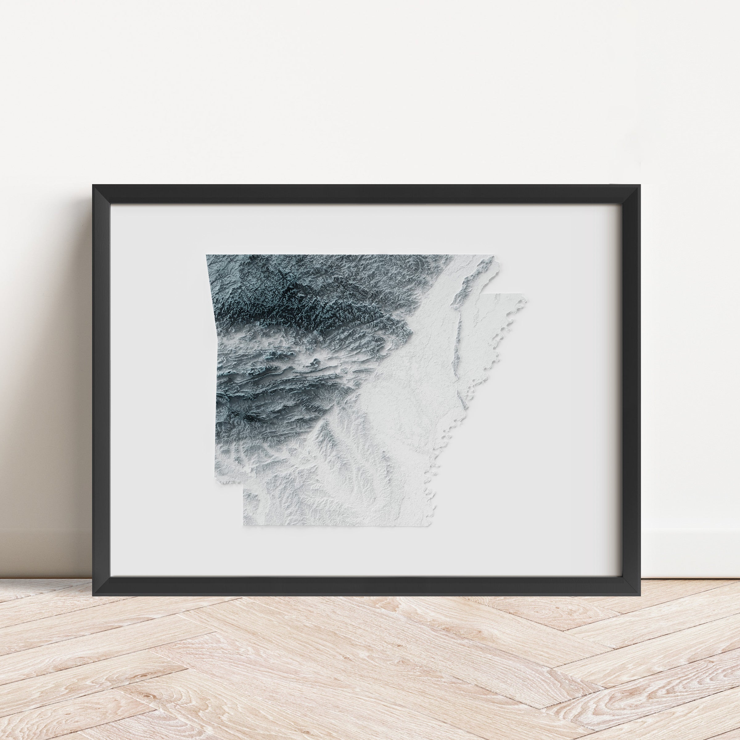 Framed minimalist elevation map of Arkansas. Minimalist topographic map art featuring detailed topography, available as premium poster for home or office decor.