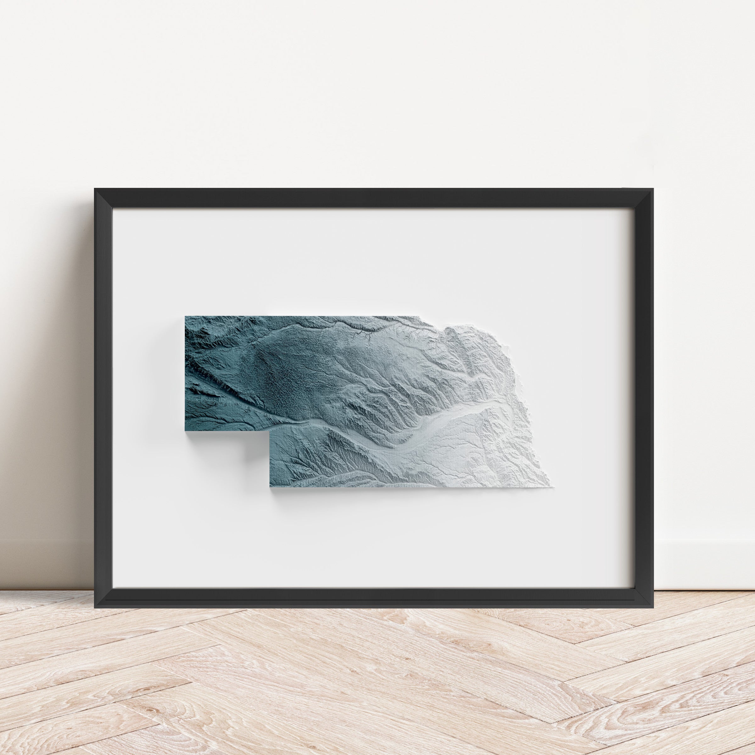 Framed minimalist elevation map of Nebraska. Minimalist topographic map art featuring detailed topography, available as premium poster for home or office decor.