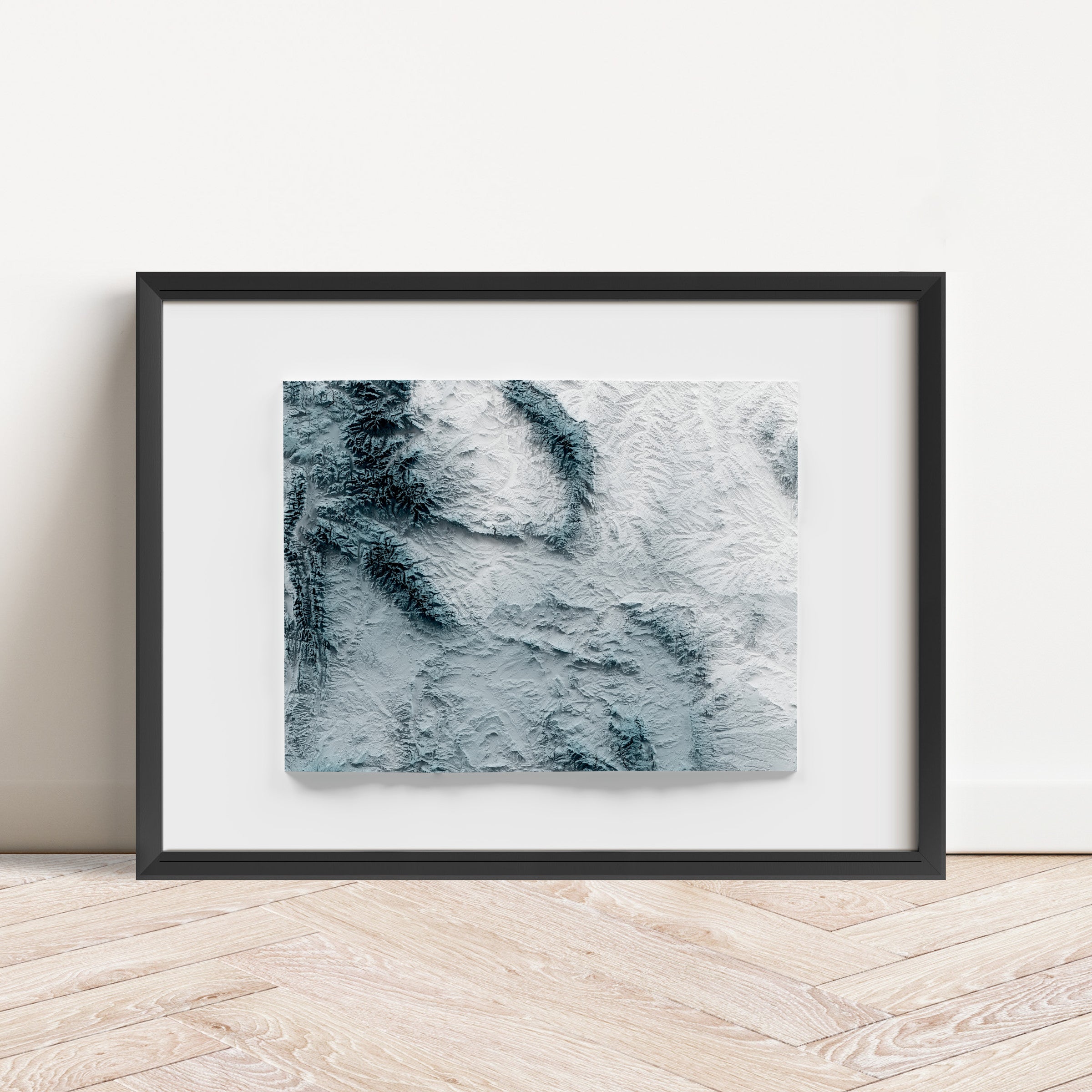Framed minimalist elevation map of Wyoming. Minimalist topographic map art featuring detailed topography, available as premium poster for home or office decor.